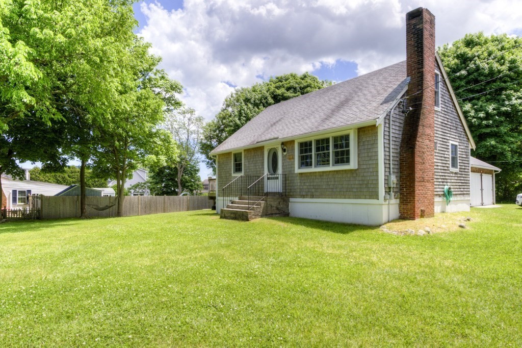 1 Factory Street Sandwich, MA 02563 - Photo 38 of 38 a view of a house with a yard and sitting area