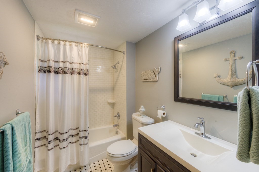 1 Factory Street Sandwich, MA 02563 - Photo 8 of 38 a bathroom with a sink vanity mirror and toilet