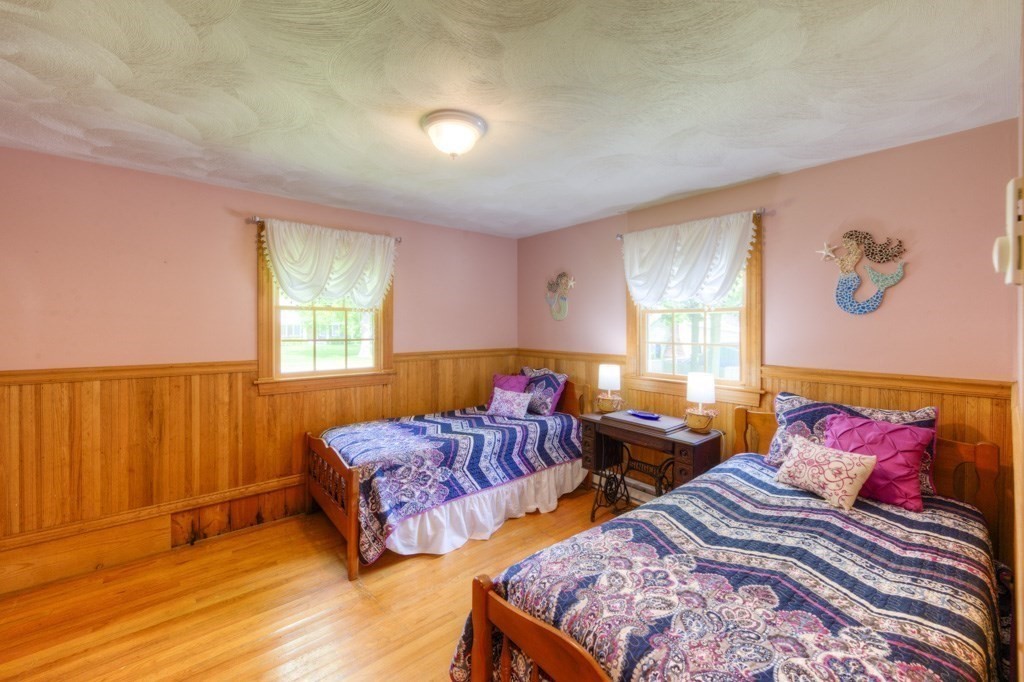 1 Factory Street Sandwich, MA 02563 - Photo 10 of 38 a bedroom with two beds and a window