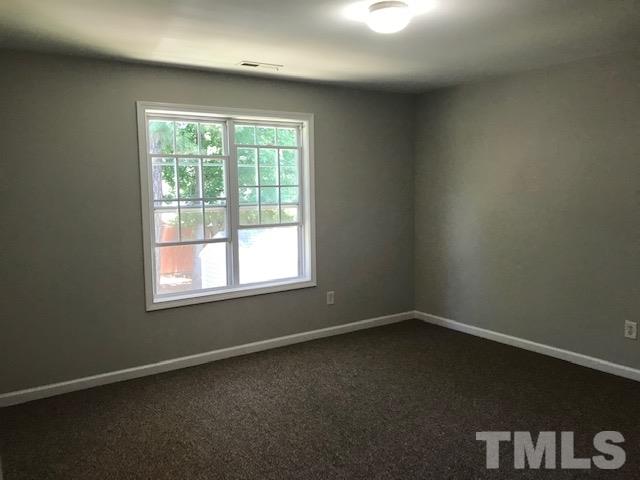 3512 Rendition Street Raleigh, NC 27610 - Photo 13 of 26 an empty room with a window