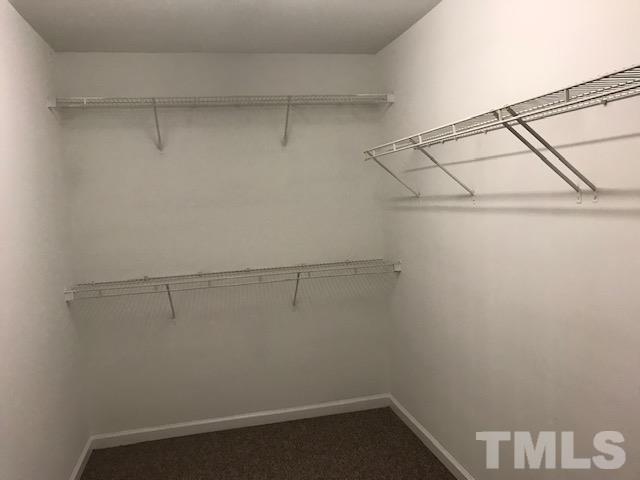 3512 Rendition Street Raleigh, NC 27610 - Photo 14 of 26 a view of a room with racks on the wall