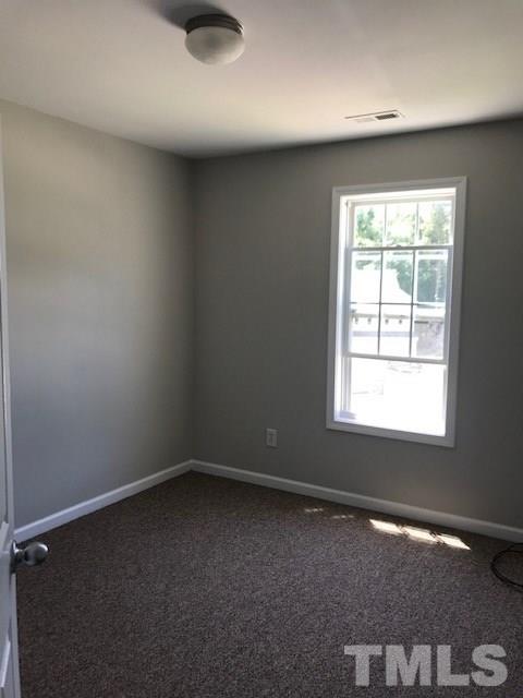 3512 Rendition Street Raleigh, NC 27610 - Photo 18 of 26 an empty room with a window