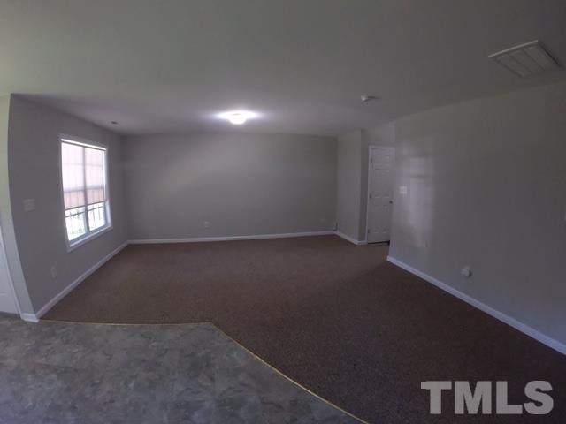3512 Rendition Street Raleigh, NC 27610 - Photo 5 of 26 an empty room with a empty space and window
