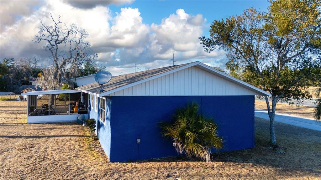 9330 Southeast Maricamp Road Ocala, FL 34472 - Photo 7 of 19 a house view with a backyard