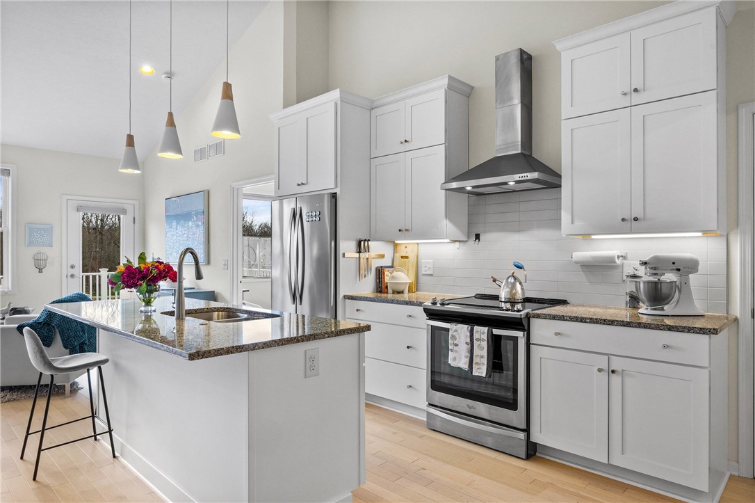 6002 Woodvine Rise Canandaigua, NY 14424 - Photo 16 of 50 Seating around the island for 4.