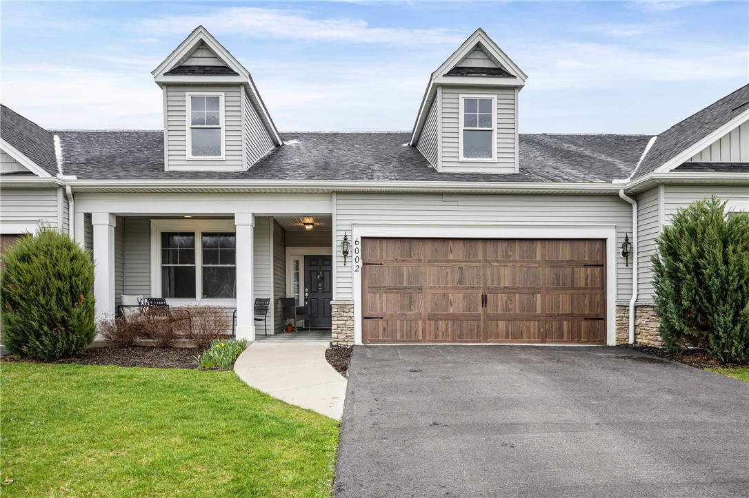 6002 Woodvine Rise Canandaigua, NY 14424 - Photo 4 of 50 a two car garage and private driveway for two addi