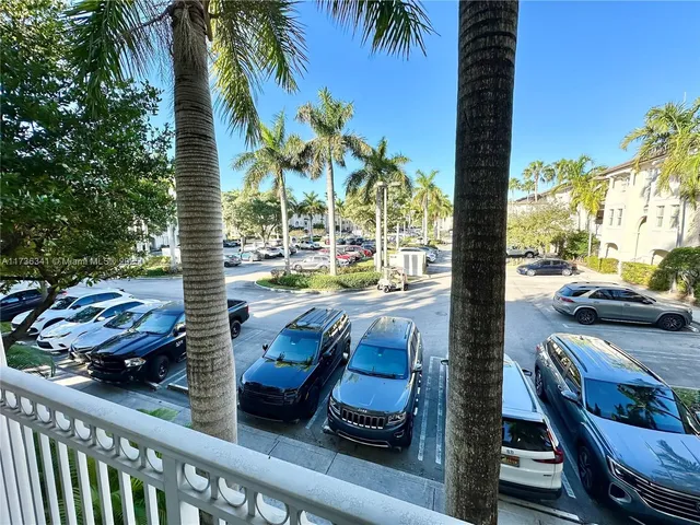 a kitchen with a refrigerator and a sink