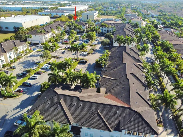 a view of a swimming pool with a lounge chair