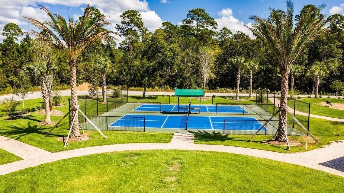 Lot 11 Clarke Hill Road Freeport, FL 32439 - Photo 14 of 18 a view of a swimming pool with a yard and palm trees