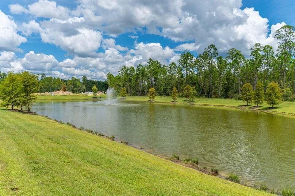 Lot 11 Clarke Hill Road Freeport, FL 32439 - Photo 9 of 18 a view of a lake with a big yard
