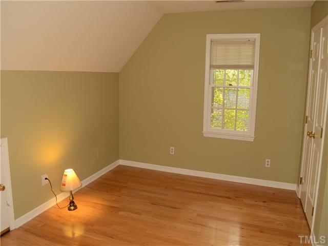 4516 Emmit Drive Raleigh, NC 27604 - Photo 9 of 13 a view of a room with wooden floor and natural light