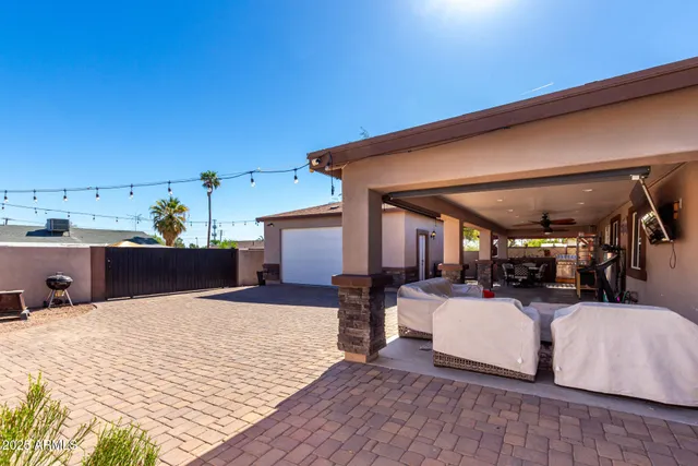 a view of a living room and kitchen
