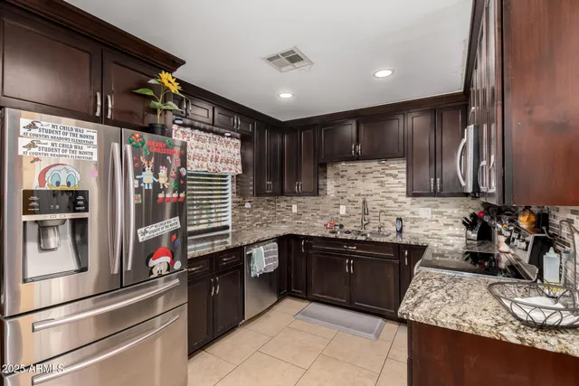 a kitchen with lots of counter space and a sink