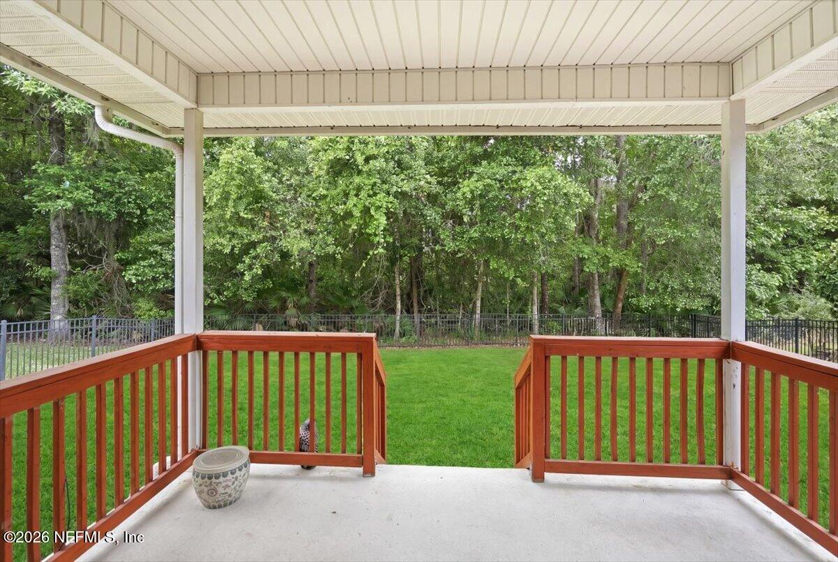 2489 Tall Cedars Road Fleming Island, FL 32003 - Photo 31 of 72 a view of a deck with a backyard