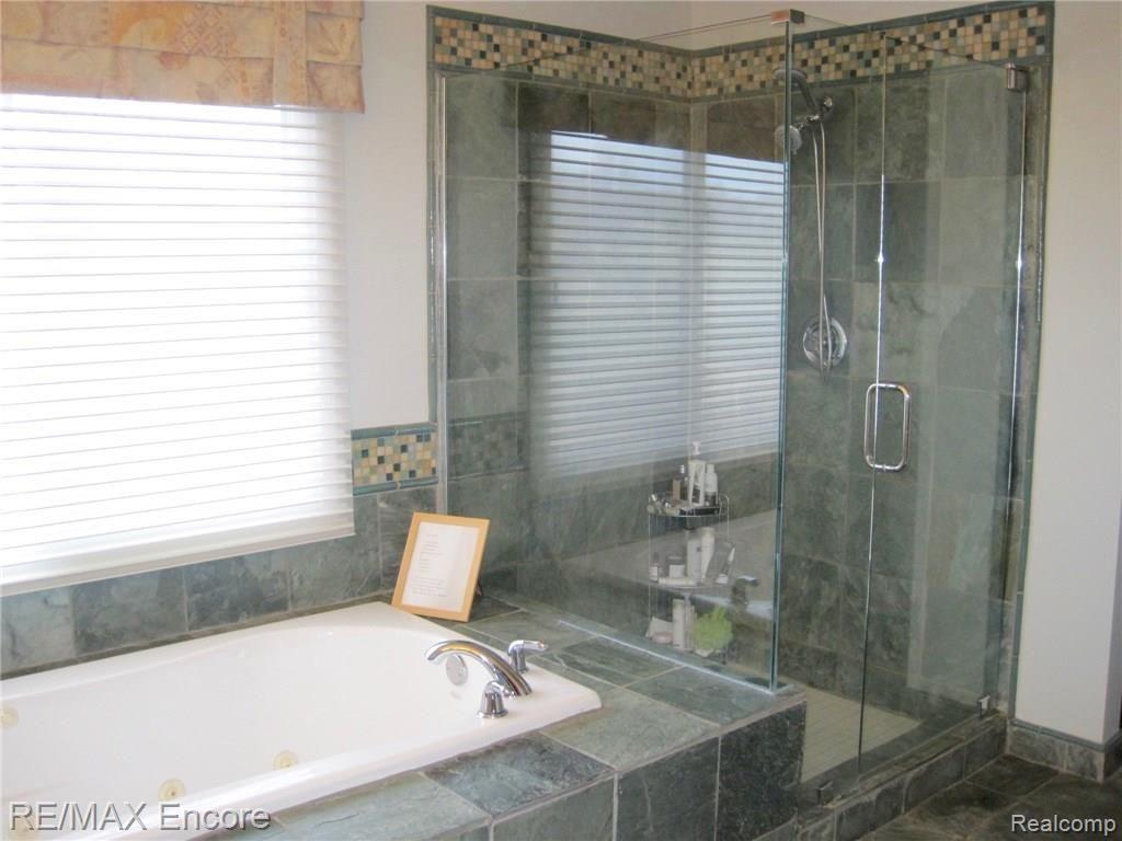 6787 Oakhurst Ridge Road Clarkston, MI 48348 - Photo 23 of 37 Master Shower and Jetted Tub
