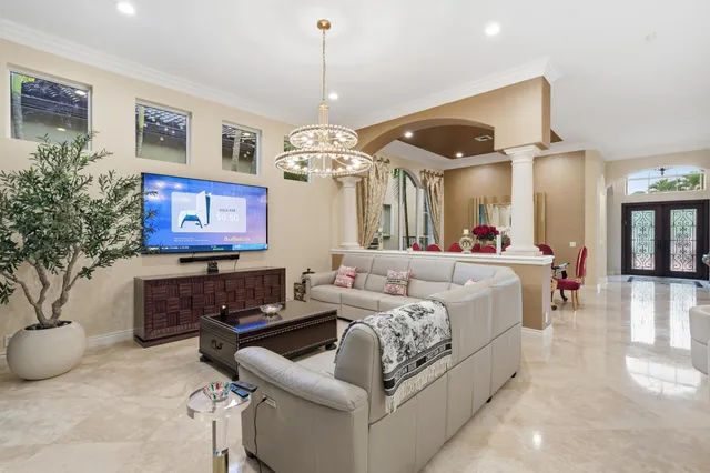 a view of a dining room with furniture and window