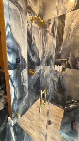 a view of swimming pool with outdoor seating and plants