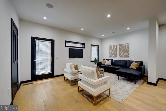 a living room with furniture and a couch