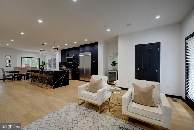 a kitchen with a table and chairs in it