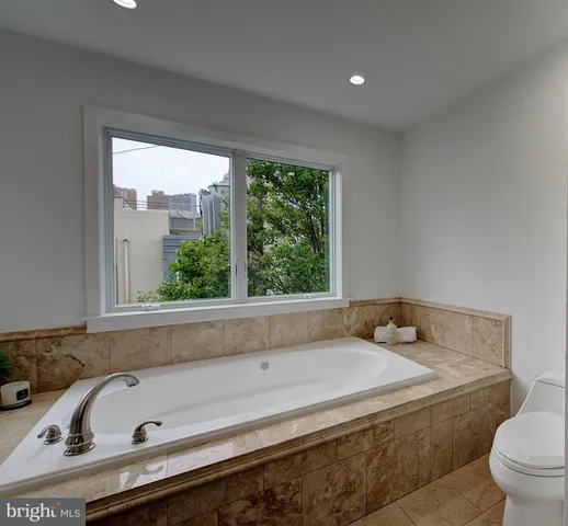 a bathroom with a sink and toilet