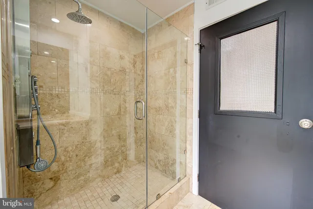 a close up of a bathtub in a bathroom