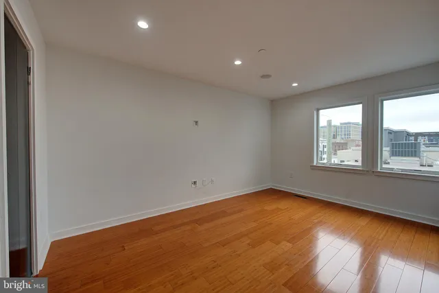a bathroom with a shower and a sink
