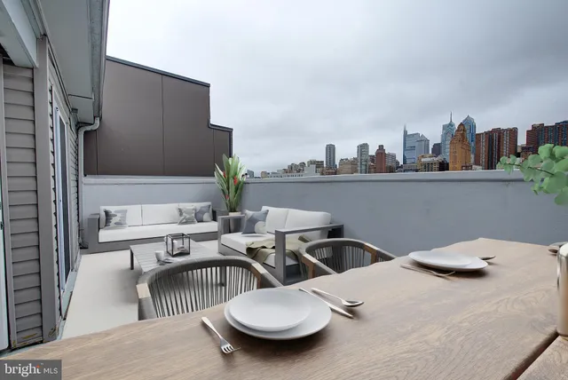 a view of a city with tall buildings