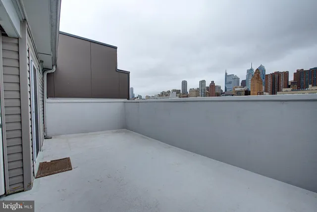 a view of a building with a street