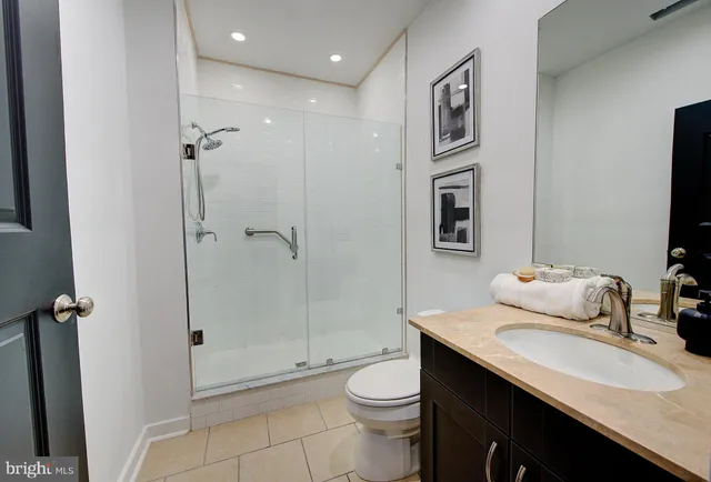 a bathroom with a toilet and a sink