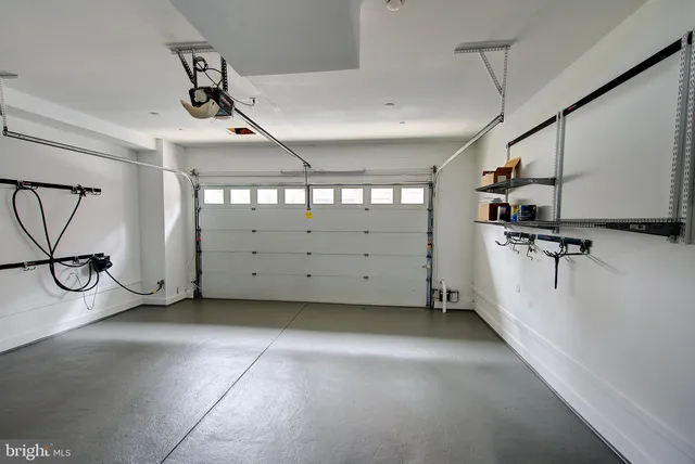 a living room with furniture rug and window
