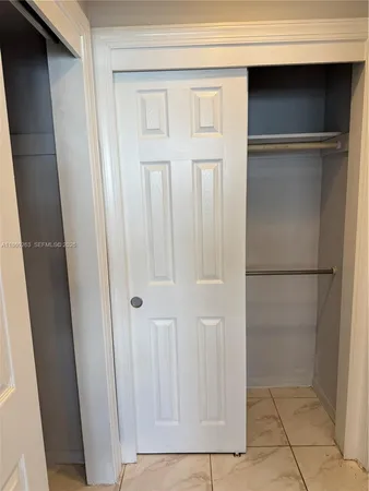 a view of stairs with wooden floor