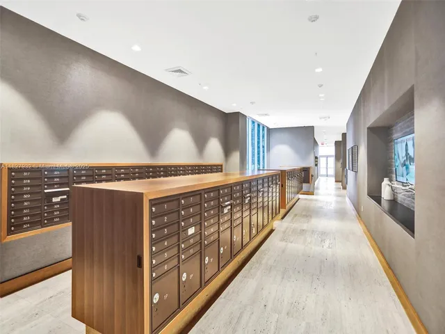 a view of gallery with wooden floor