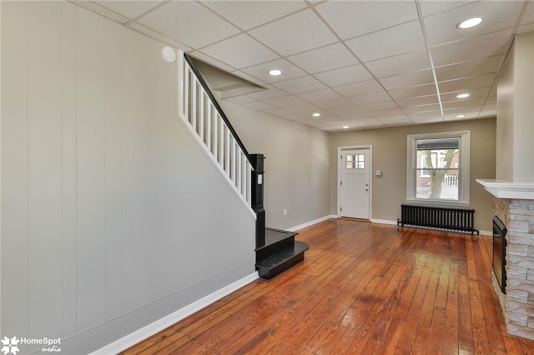 619 Sioux Street Bethlehem, PA 18015 - Photo 17 of 61 a view of empty room with wooden floor and fan