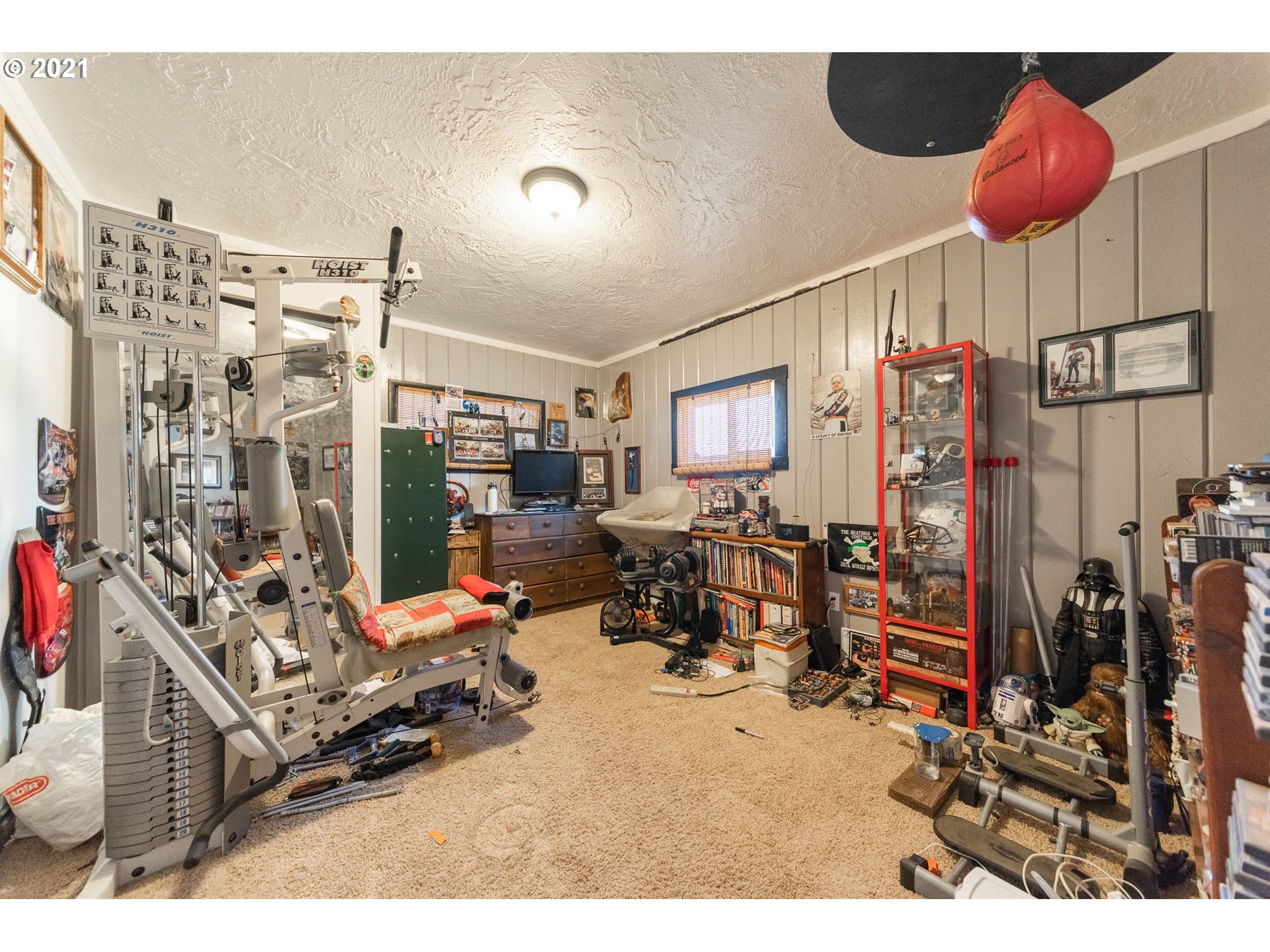 38383 Dexter Road Dexter, OR 97431 - Photo 17 of 32 a room with gym equipment and large mirror