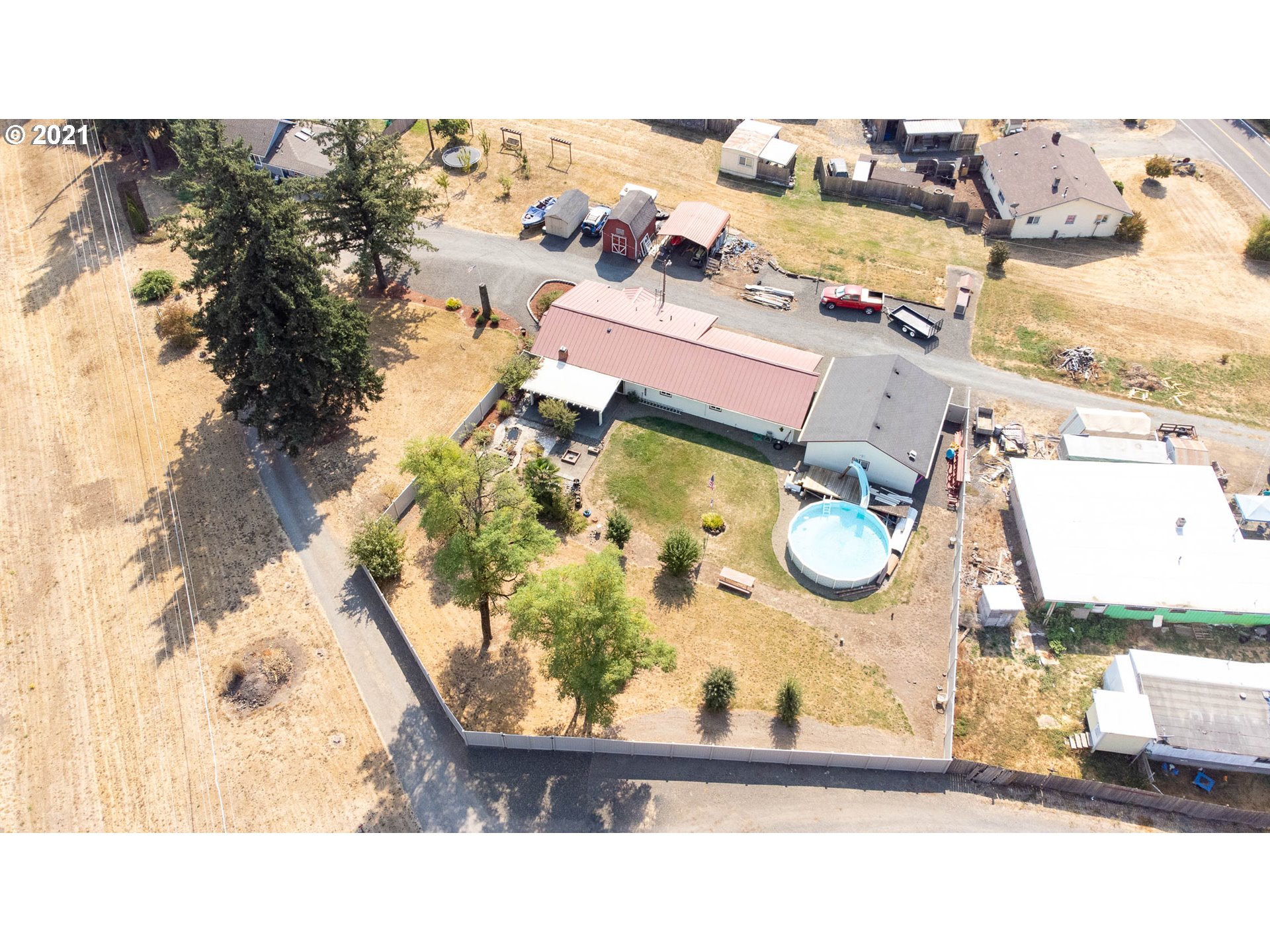 38383 Dexter Road Dexter, OR 97431 - Photo 30 of 32 an aerial view of a house with a swimming pool