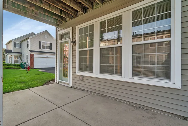 a view of house exterior with open windows