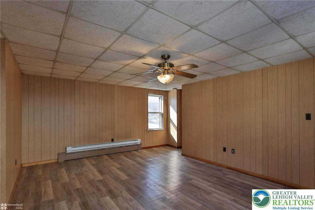 115 East Ruddle Street Coaldale, PA 18218 - Photo 17 of 61 wooden floor in an empty room with a window