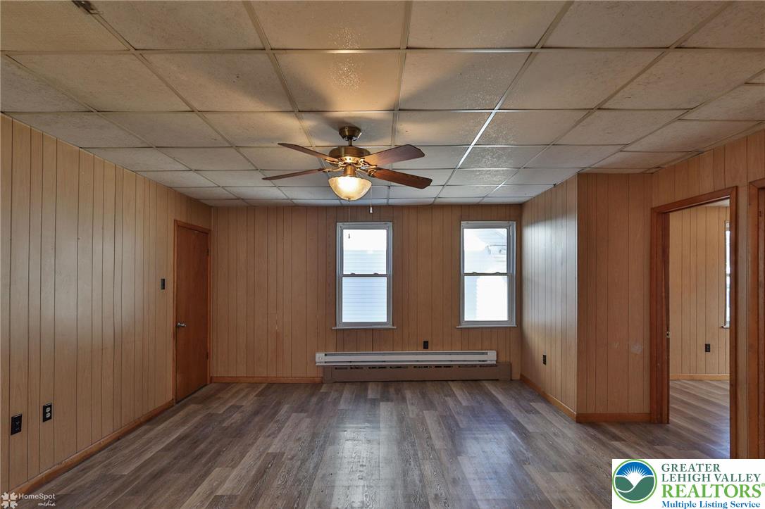 115 East Ruddle Street Coaldale, PA 18218 - Photo 19 of 61 a view of a livingroom with a ceiling fan and window