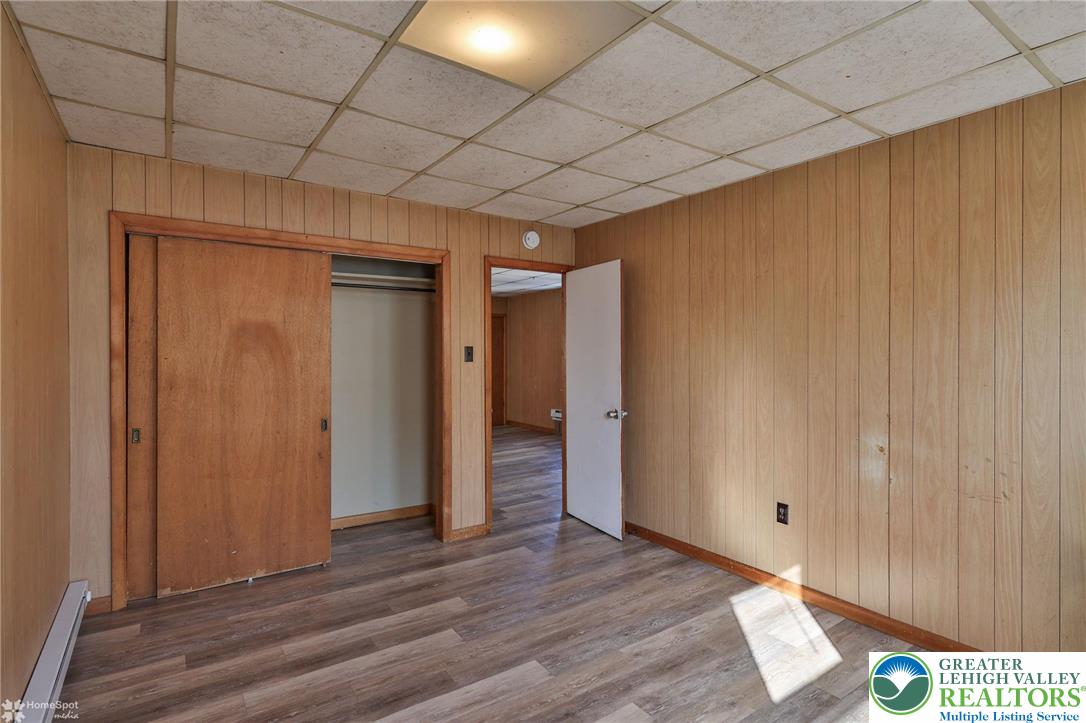 115 East Ruddle Street Coaldale, PA 18218 - Photo 28 of 61 a view of an empty room with wooden floor