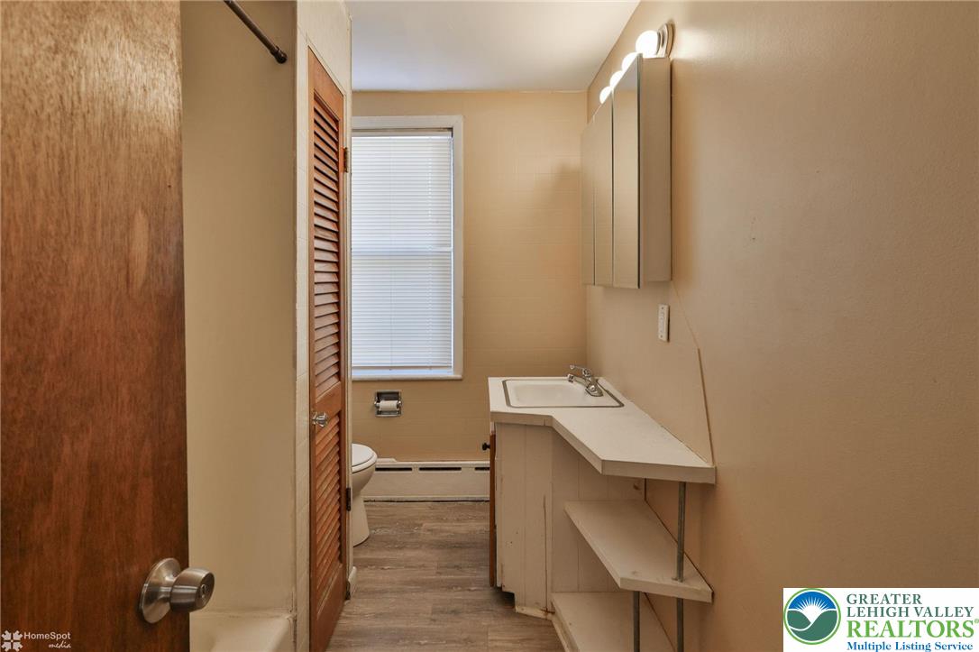 115 East Ruddle Street Coaldale, PA 18218 - Photo 30 of 61 a bathroom with a sink and a mirror