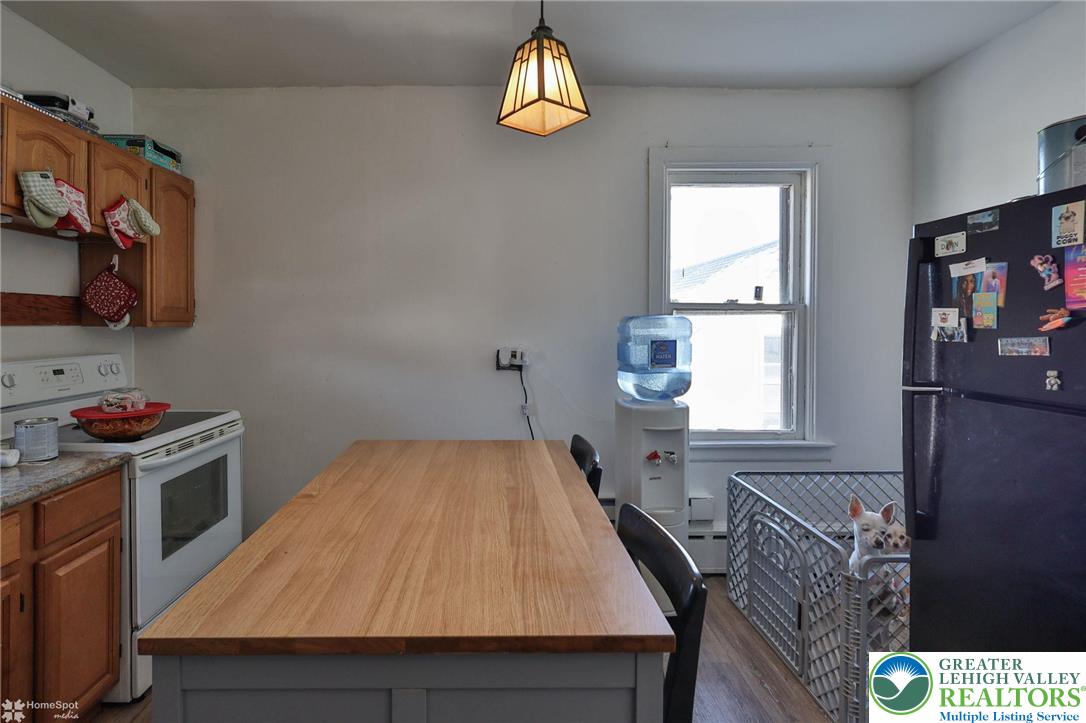 115 East Ruddle Street Coaldale, PA 18218 - Photo 43 of 61 a room with wooden floor and window