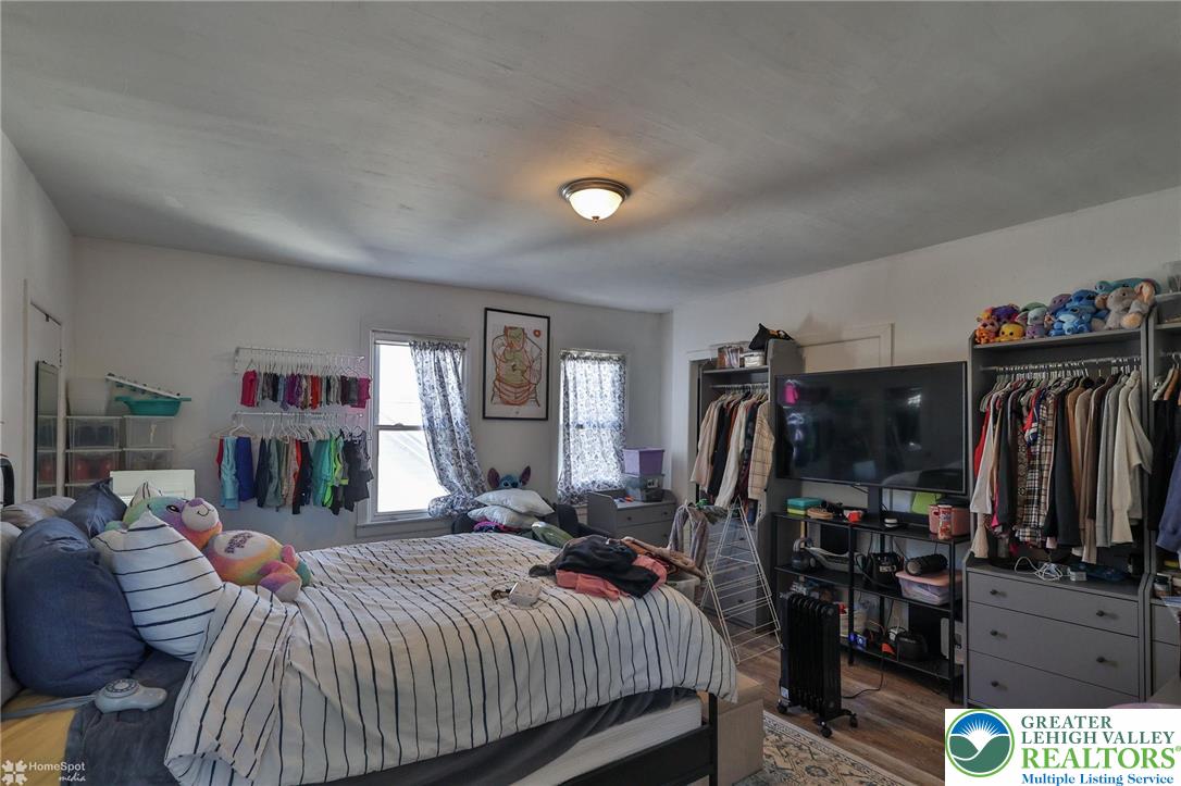 115 East Ruddle Street Coaldale, PA 18218 - Photo 47 of 61 a bed room with a bed and a walk in closet