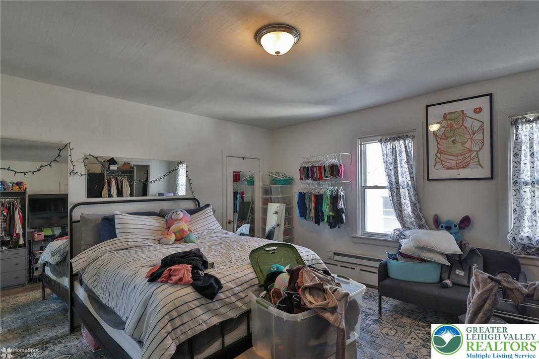 115 East Ruddle Street Coaldale, PA 18218 - Photo 49 of 61 a bedroom with furniture and wooden floor