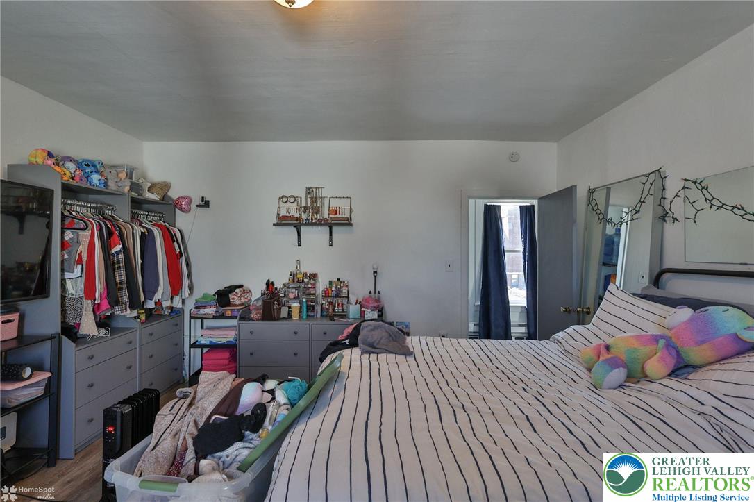 115 East Ruddle Street Coaldale, PA 18218 - Photo 50 of 61 a bedroom with a bed and a large mirror