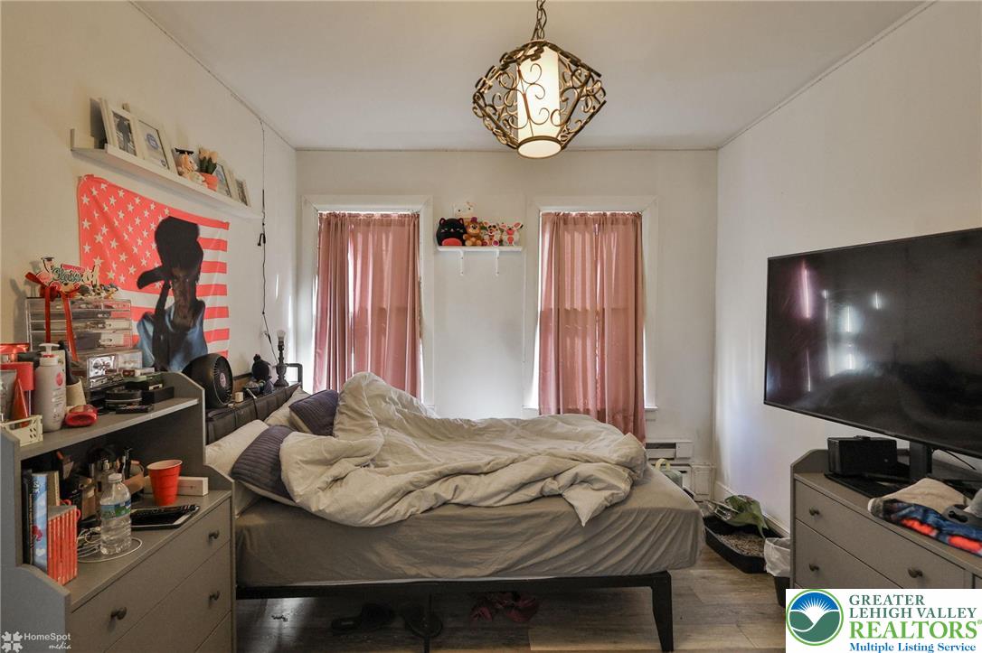 115 East Ruddle Street Coaldale, PA 18218 - Photo 56 of 61 a bedroom with a bed and a flat screen tv