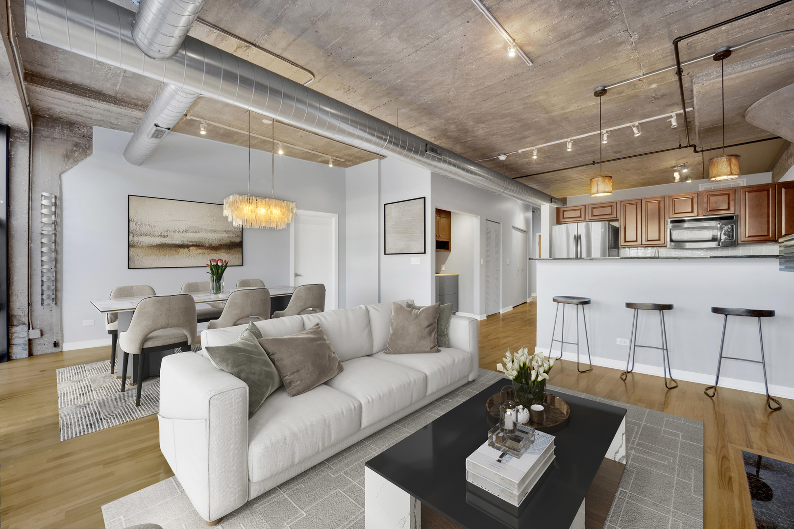 1111 West 15th Street, Unit 224 Chicago, IL 60608 - Photo 11 of 71 a living room with furniture and a chandelier