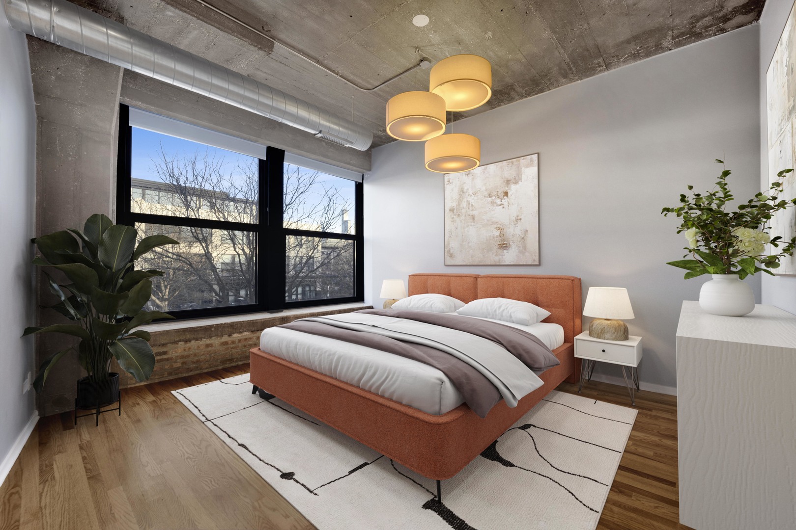 1111 West 15th Street, Unit 224 Chicago, IL 60608 - Photo 12 of 71 a bedroom with a large bed and a potted plant