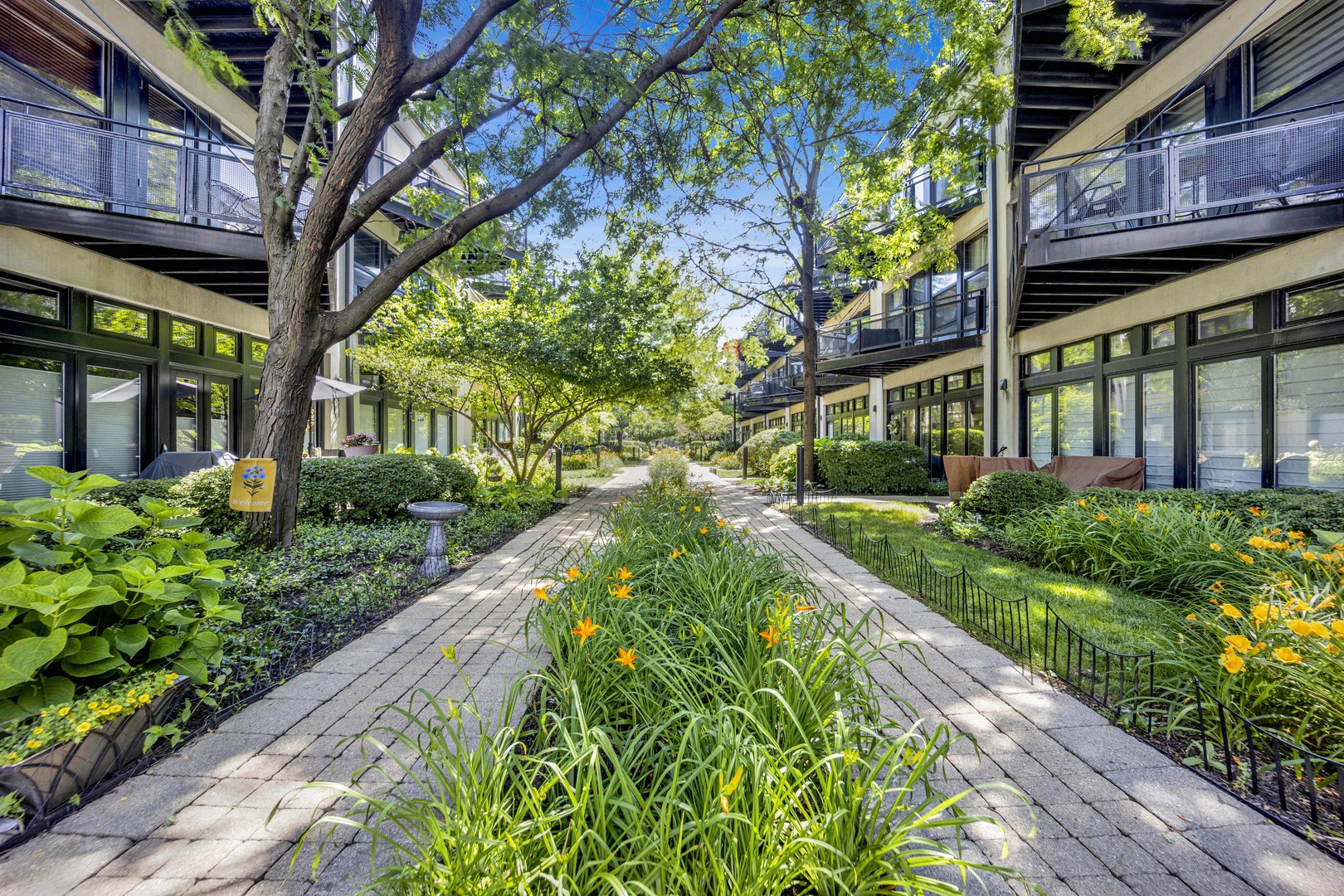 1111 West 15th Street, Unit 224 Chicago, IL 60608 - Photo 25 of 71 a view of a garden with pathway