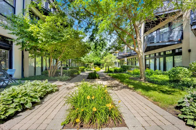 a view of a building with a yard