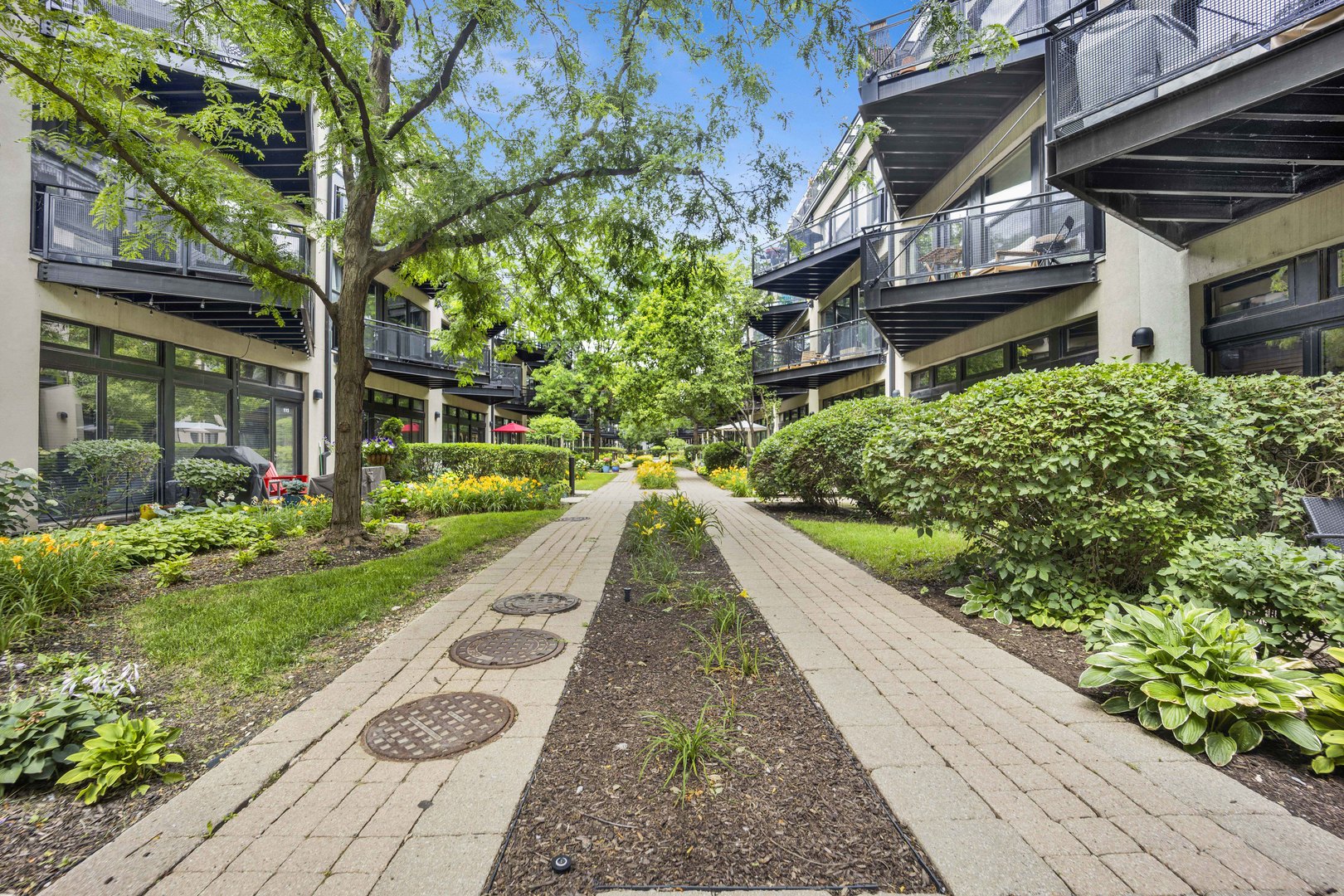 1111 West 15th Street, Unit 224 Chicago, IL 60608 - Photo 32 of 71 a view of house with yard